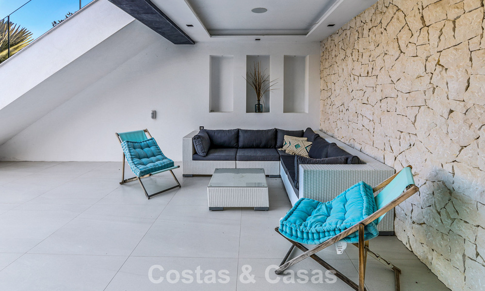 Exclusieve eigentijdse villa met panoramisch zeezicht te koop in Los Flamingos een 5* golfresort in Marbella - Benahavis 804794