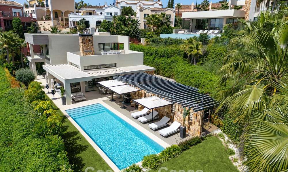 Luxe moderne villa met zeezicht te koop in Nueva Andalucia’s golfvallei, Marbella 806054