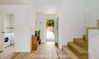 Instapklare, schakelwoningen met Mediterrane bouwstijl te koop direct aan de golfbaan in Estepona 806883 