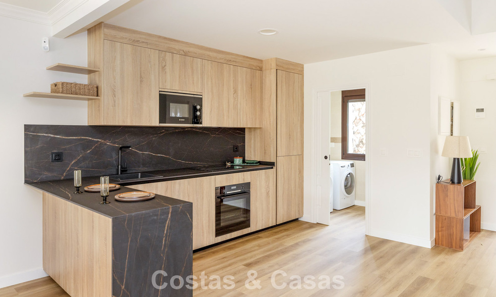 Instapklare, schakelwoningen met Mediterrane bouwstijl te koop direct aan de golfbaan in Estepona 806895