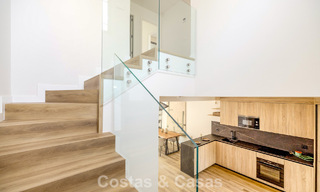 Instapklare, schakelwoningen met Mediterrane bouwstijl te koop direct aan de golfbaan in Estepona 806909 
