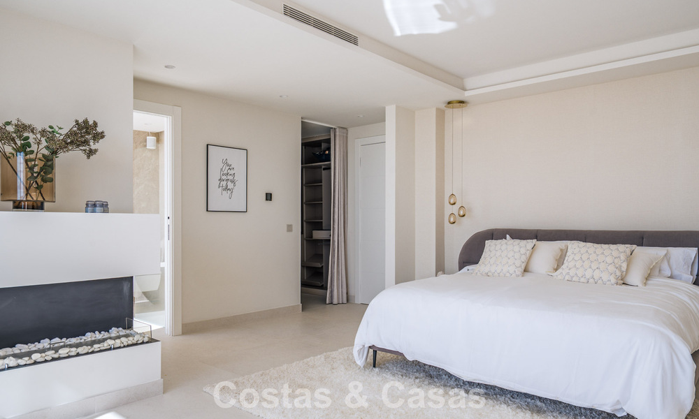 Luxe duplex penthouse met panoramisch uitzicht te koop in Nueva Andalucia’s golfvallei, Marbella 808078